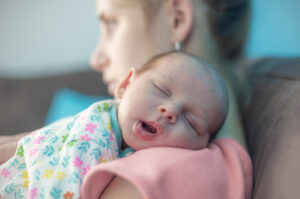mom with ppd holding baby