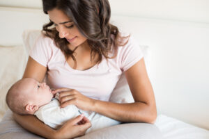  mother holding baby