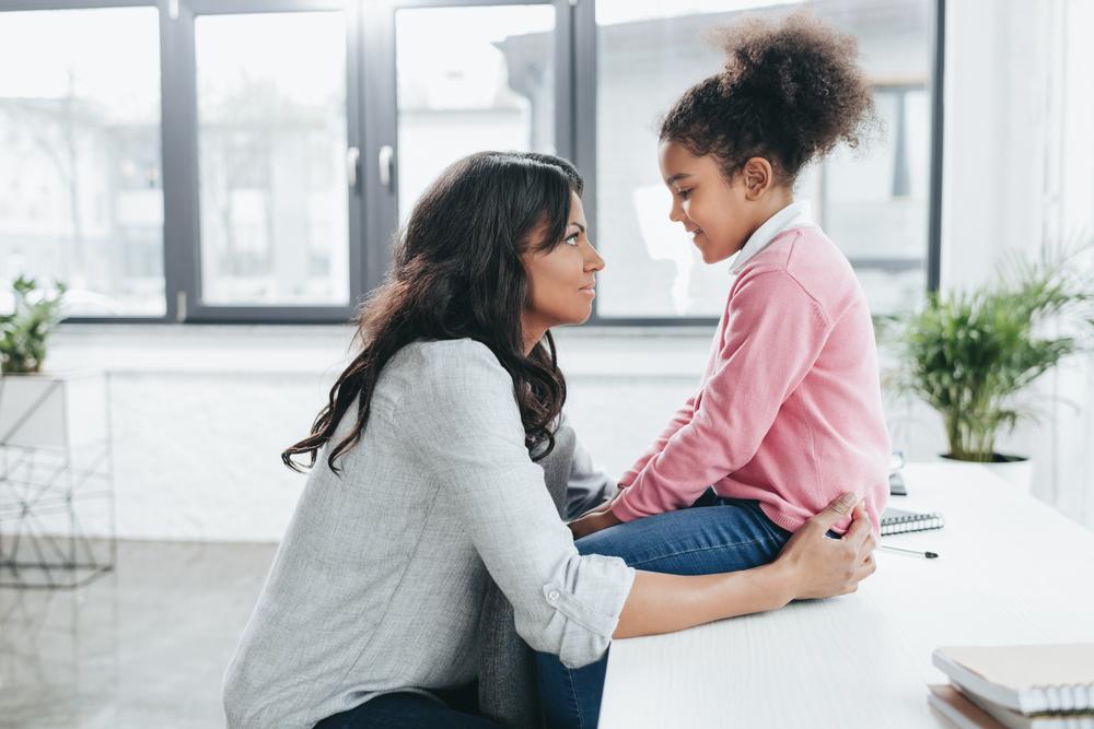 woman talking to daughter
